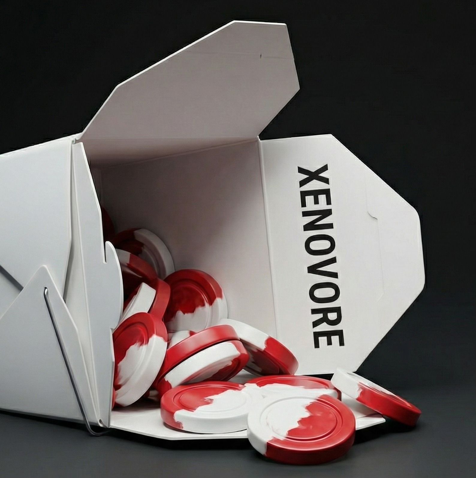 A takeout box branded XENOVORE.